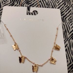 LA hearts butterfly necklace with pink beads